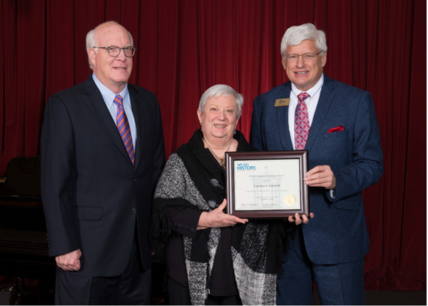 Carolyn Schmidt received the Hubert Hawkins History Award from David Evans, Board Chair, (left) and John Herbst, President and CEO of the Indiana Historical Society. Photo courtesy Indiana Historical Society 